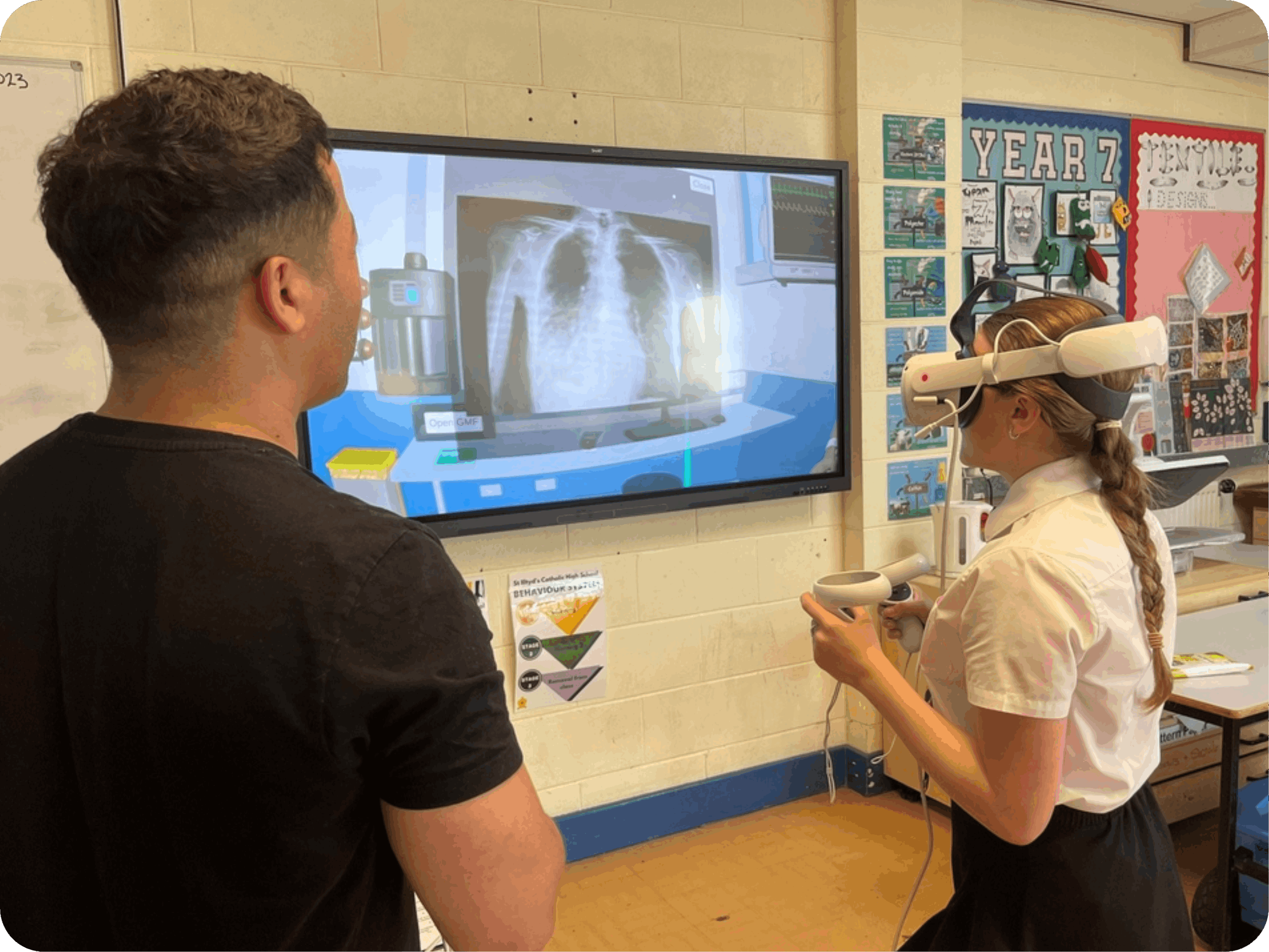 Student exploring a virtual X-ray scenario on screen during a workshop
